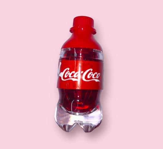 Tinta de labios en forma de botella de coca cola